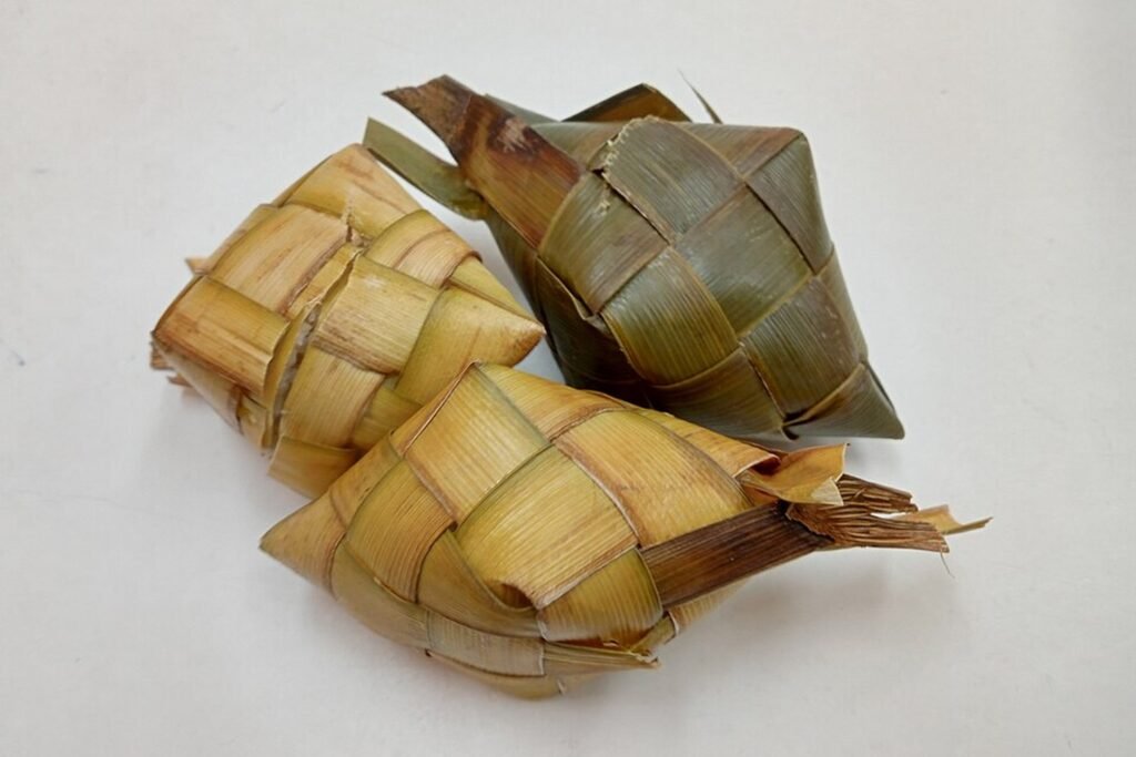 Traditional Cebuano puso rice wrapped in woven coconut leaves, a popular local food in Cebu.